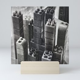 Playing in the city of bricks and stones Mini Art Print
