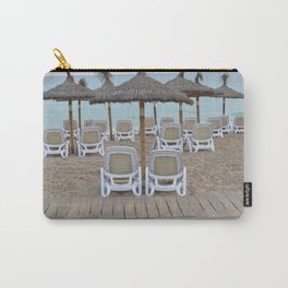 Two amacas or sunbeds and a lot of umbrellas in the mediterranean sea holiday a Carry-All Pouch