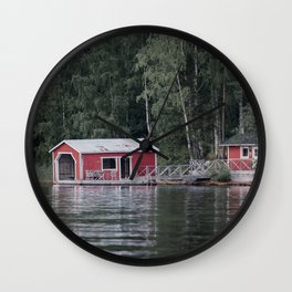 Red Cottage next to Calm Water Lake Finland Wall Clock