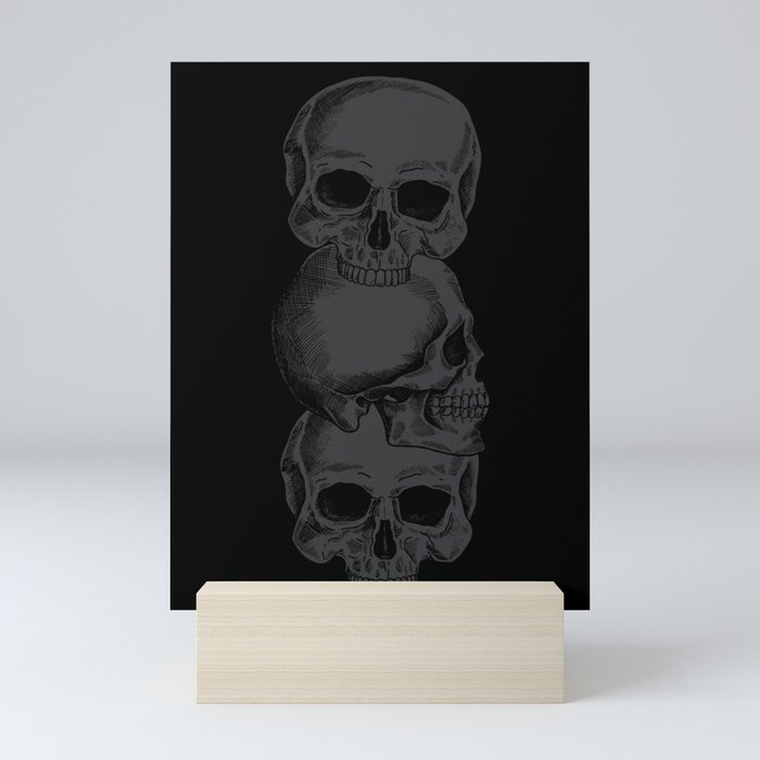 3 Black Skulls Stacked On Top of Each Other Mini Art Print