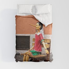 Pinocchio Marionette Sitting on Street Bench Comforter