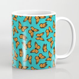 monarch butterflies - orange on teal Coffee Mug