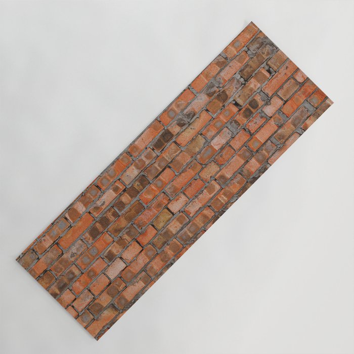 Texture of an old brick wall closeup Yoga Mat