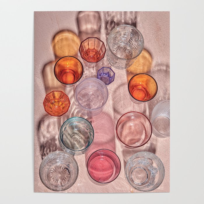 Colourful glasses on a handpainted table with long shadows Poster
