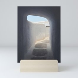 Pyrgos, Santorini | Greek tunnel inside a white building  Mini Art Print