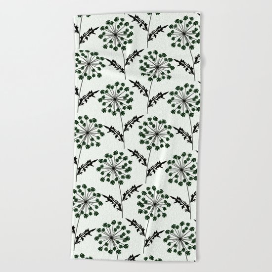 Delicate flowers on a black background. Beach Towel