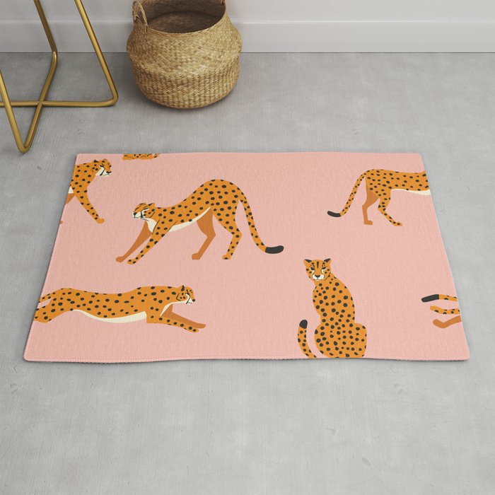 Cheetahs pattern on pink Rug by BlueLela Society6