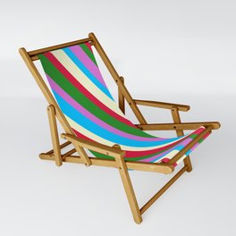 [ Thumbnail: Orchid, Deep Sky Blue, Light Yellow, Crimson, and Forest Green Colored Pattern of Stripes Sling Chair ]