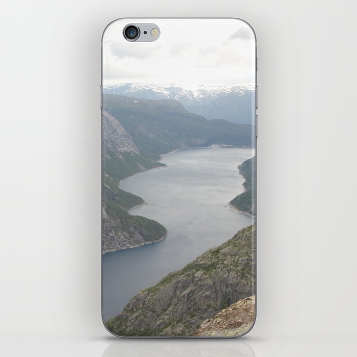 Laying on the edge of the world iPhone Skin