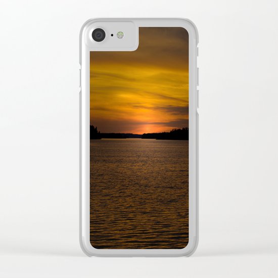 The sun goes down and night falls Clear iPhone Case