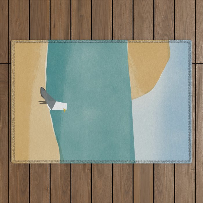 Lone seagull by the beach Outdoor Rug