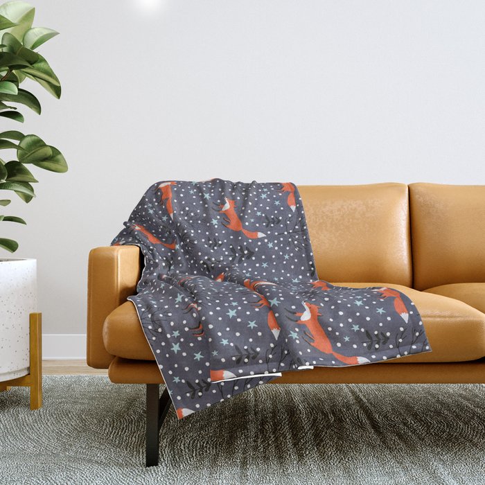 Red foxes in the nignt winter forest Throw Blanket