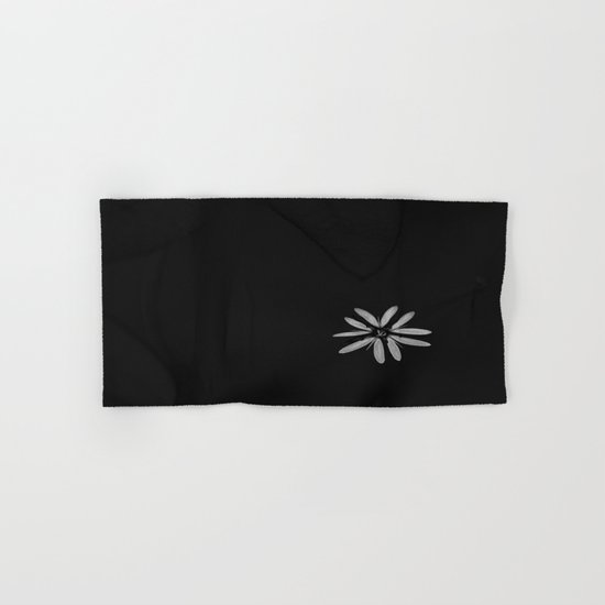 One Tiny White Flower on Black Background Hand & Bath Towel