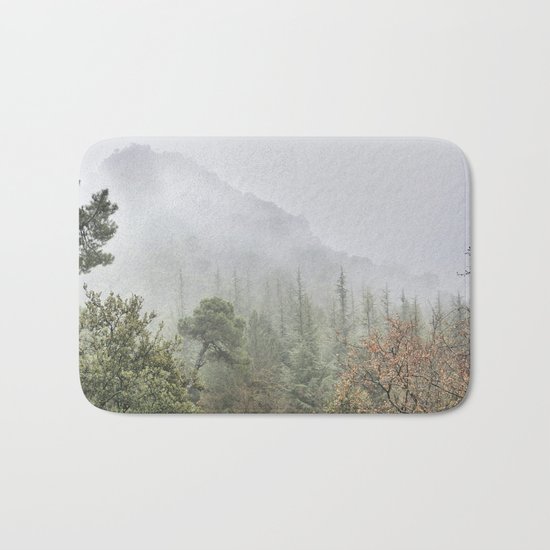 Into the deep forest. Foggy morning Bath Mat