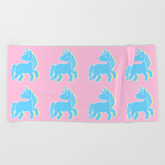 Blue unicorn in a pink world Beach Towel