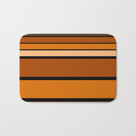 Black and yellow , brown and orange striped pattern . Bath Mat