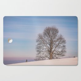 The lonely tree on a winter day Cutting Board