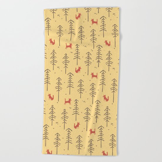 Fox hiding in the forest Beach Towel