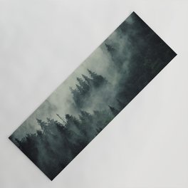 Misty pine forest on the mountain slope in a nature reserve Yoga Mat