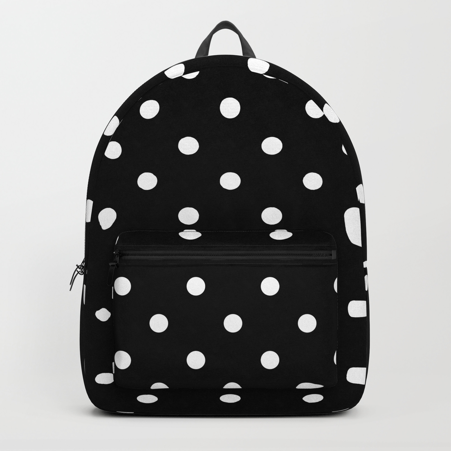 Black and white polka dot backpack