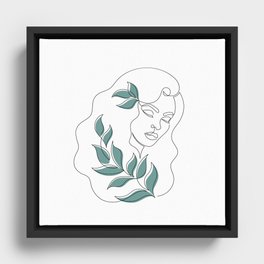 Portrait of a woman with green leaves in linear art style.  Framed Canvas