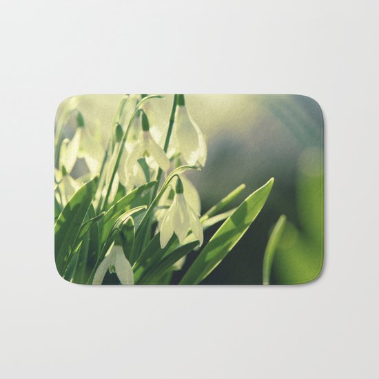 Snowdrops impression from the garden Bath Mat