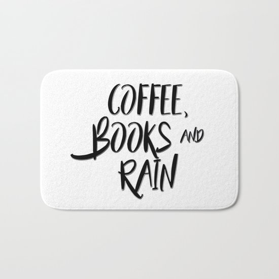 Coffee, books and rain quote Bath Mat