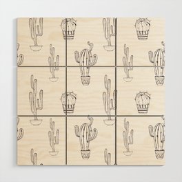 A pattern of black and white cacti painted with black ink Wood Wall Art