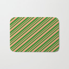 [ Thumbnail: Light Salmon & Forest Green Colored Lined Pattern Bath Mat ]