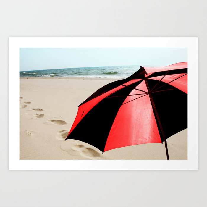 Red and Black Umbrella on the Beach with Footprints Art Print by Randy