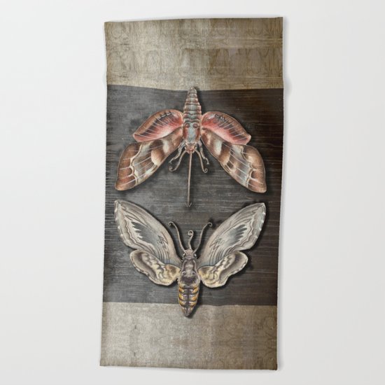 The circle of the moths Beach Towel