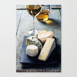 Various types of cheese and white wine Canvas Print