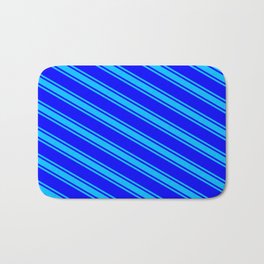 [ Thumbnail: Blue & Deep Sky Blue Colored Lines/Stripes Pattern Bath Mat ]