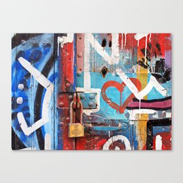 Vibranit graffiti on old wooden door Canvas Print