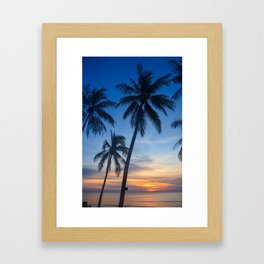 Beautiful blue sky tropical sunrise seascape with Palm trees, Thailand. Framed Art Print