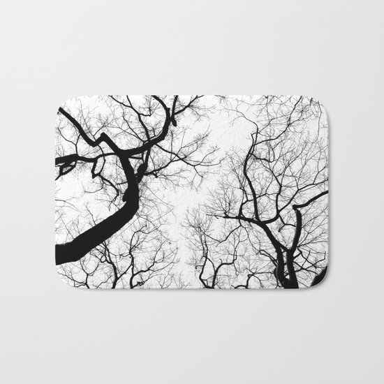 Black and white tree top silhouettes... Bath Mat