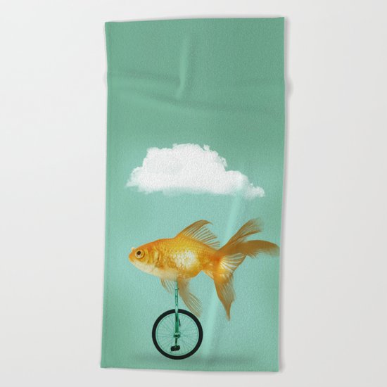unicyle goldfish III Beach Towel