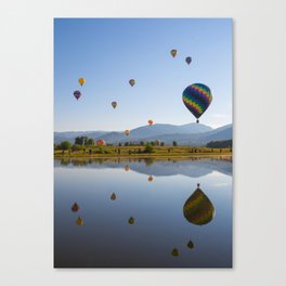 Hot air balloons reflection in lake Canvas Print