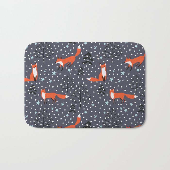 Red foxes in the nignt winter forest Bath Mat