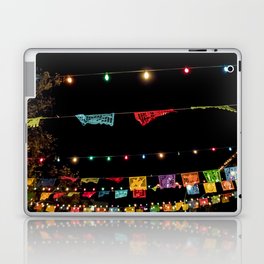 Beautiful Rainbow Colored Paper Flags and Lights Hang across a Day of the Dead Evening Celebration Laptop Skin