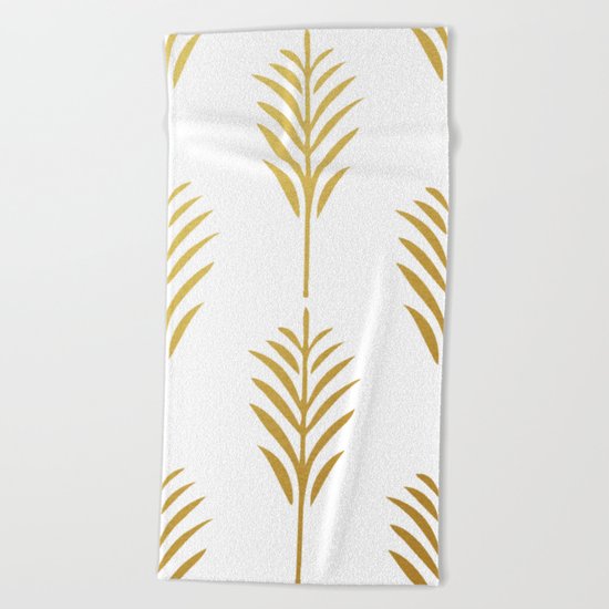 Golden Palm Leaves on White Beach Towel