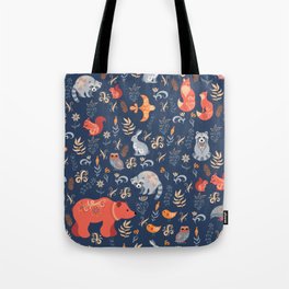 Fairy-tale forest. Fox, bear, raccoon, owls, rabbits, flowers and herbs on a blue background. Seamle Tote Bag