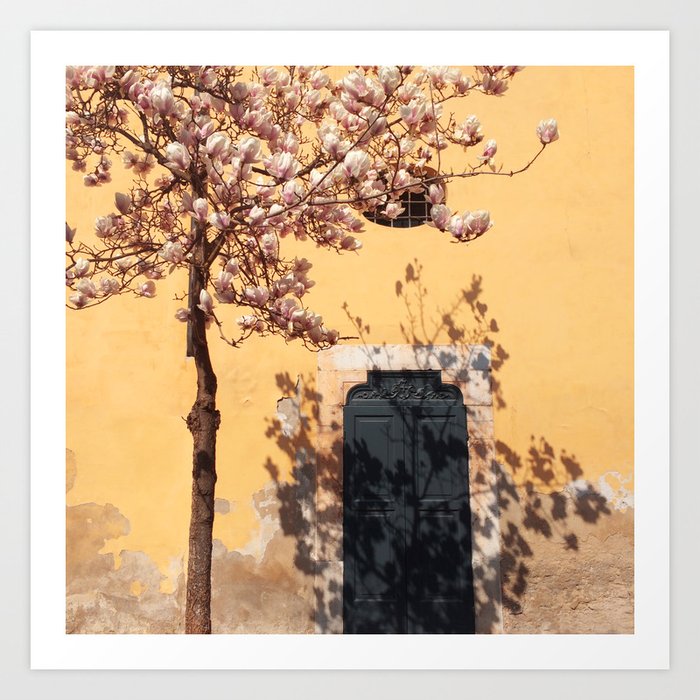 blooming tree on yellow wall background Art Print