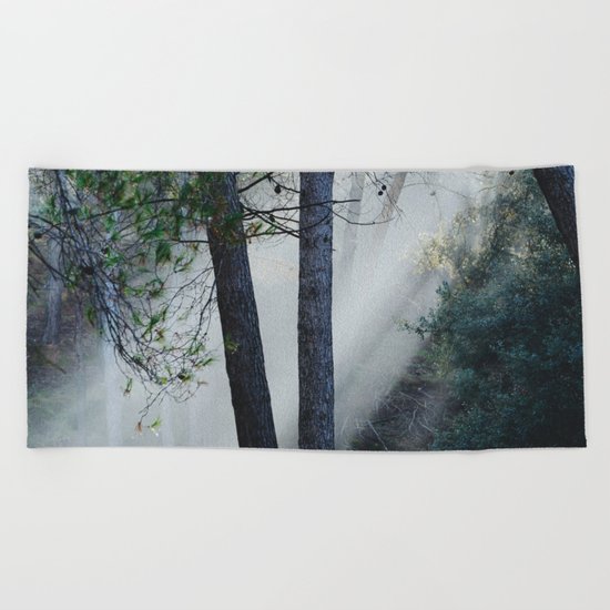 "Sunrays through the foggy forest". Retro dreams.... Beach Towel