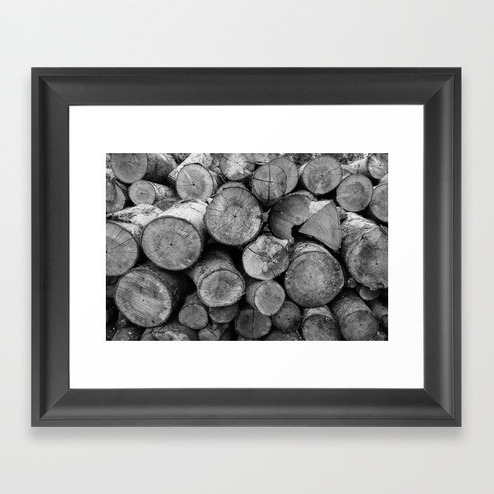 Pile of chopped firewood Framed Art Print