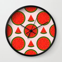 slices of red watermelon on a pink background Wall Clock
