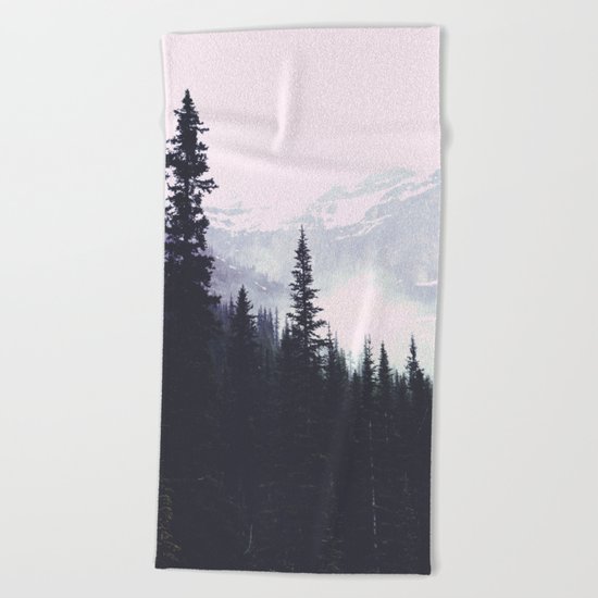Evergreens in the fog edit Beach Towel