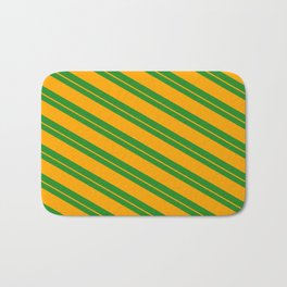 [ Thumbnail: Forest Green and Orange Colored Pattern of Stripes Bath Mat ]