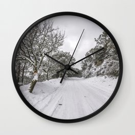 Snowy road Wall Clock