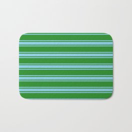 [ Thumbnail: Forest Green and Sky Blue Colored Lined/Striped Pattern Bath Mat ]